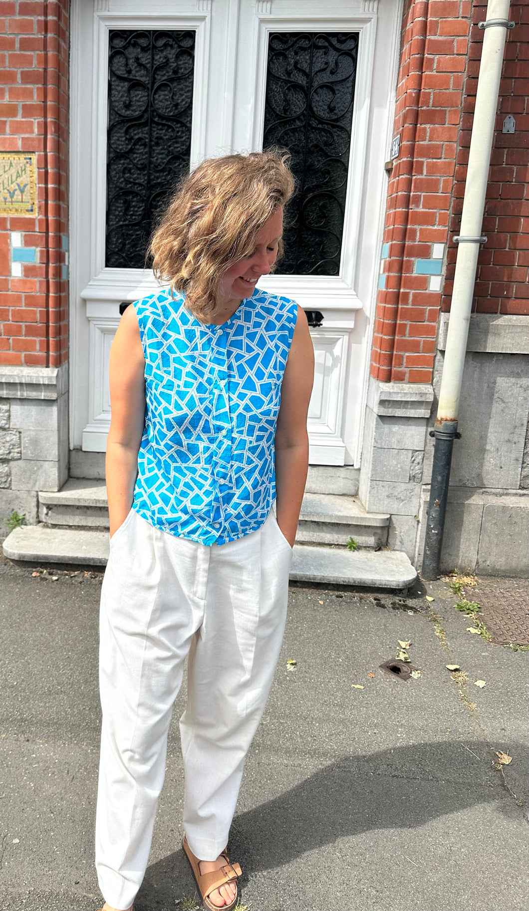 Top bleu sans manche