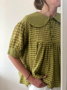 Blouse verte à carreaux